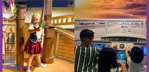 The image is split into two sections. On the left, a young child dressed in a pirate costume holds onto a wooden ship wheel, pretending to steer. The right side shows three children from behind looking at a large screen simulating an airplane cockpit view during flight, suggesting they are engaging in a flight simulation experience. Both scenes depict interactive and imaginative play environments.