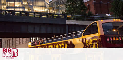 Image capturing a Big Bus New York tour bus in the foreground with its distinct red and yellow branding visible. The bus appears parked or in slow transit, with the High Line, an elevated park and walkway, in the background during evening hours as indicated by the ambient lighting.