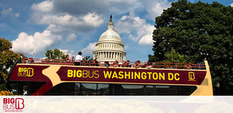 The image showcases an open-top, double-decker Big Bus with tourists on board, set against a backdrop of the Capitol Building in Washington DC on a sunny day with scattered clouds. The bus is prominently labeled with 'Big Bus Washington DC' on the side, captured while stationary or in motion.