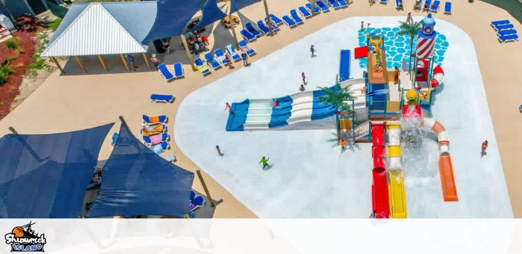 Aerial view of a vibrant water park with slides and lounge chairs.