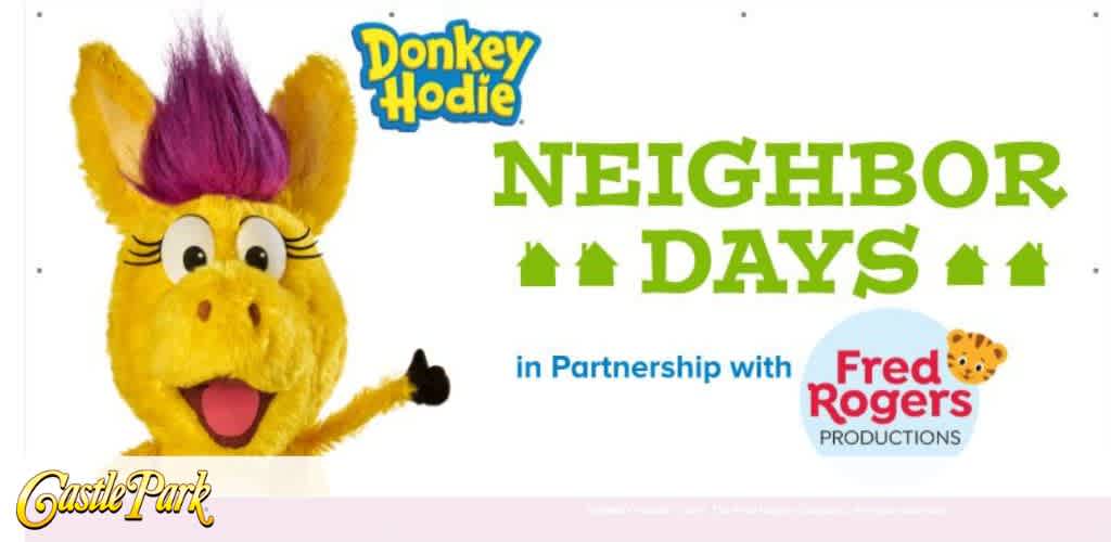 Yellow donkey with purple hair, large eyes, and a friendly smile is waving. The text reads Donkey Hodie Neighbor Days in green letters with small house icons. Below is in partnership with Fred Rogers Productions with a tiger face graphic. Castle Park logo is at the bottom left.