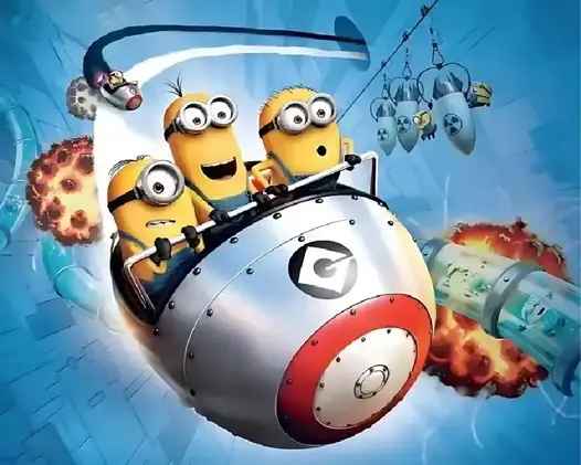 Animated scene featuring three yellow, cylindrical characters with goggles, riding in a futuristic, spherical vehicle through a vibrant blue tunnel. They appear excited, with wide eyes and open mouths. Explosive effects and whimsical flying machines enhance the dynamic atmosphere of joy and adventure.