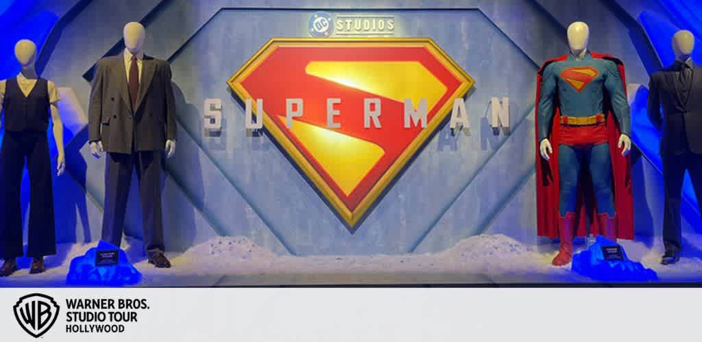 Superman costume display at Warner Bros. Studio Tour with mannequins in Superman and civilian outfits.