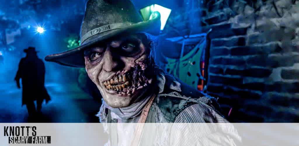Grotesque character at a night attraction, with a blue-lit background.
