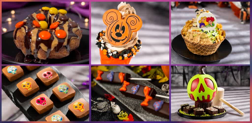 Assorted Halloween themed candies and cupcakes decorated with colorful icing and festive designs on a dark surface.