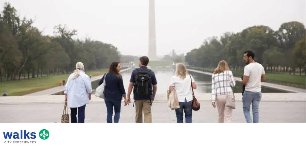 Group of six diverse people walking near the Washington Monument on a cloudy day in Washington DC