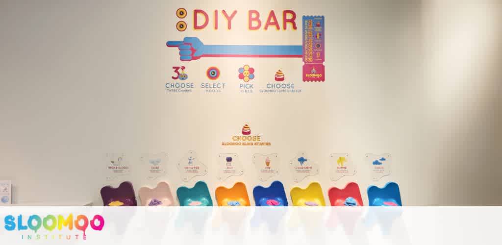 Colorful wall display showing a DIY bar with options for customizing slime ingredients and toppings.