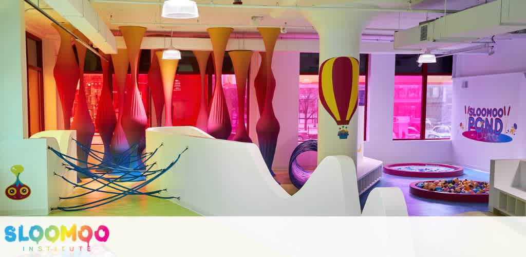 Indoor play area with colorful structures, soft play zones, and a ball pit designed for children's fun and activities at funex com