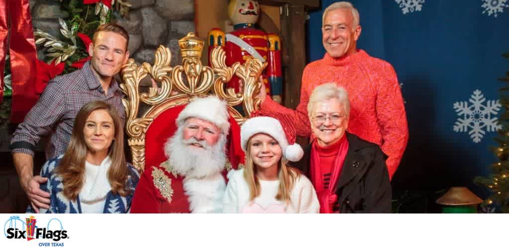Group photo with Santa Claus and festive decorations.