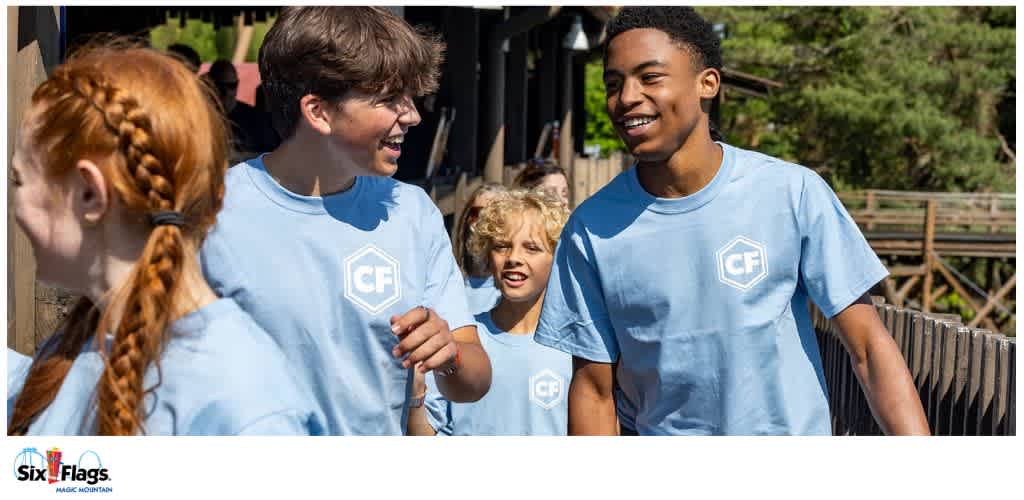 Group of young people in light blue 