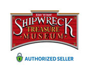 Image displays the sign for the Key West Shipwreck Treasure Museum, with stylized text suggesting an old-time theme. The context suggests the location is a historic attraction. A badge in the lower right indicates the entity as an authorized seller. The sign features red and gold tones with a white background.