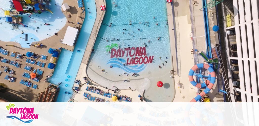Aerial view of Daytona Lagoon water park with pools, slides, and visitors.
