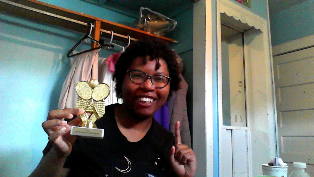 Picture of me and tennis trophy