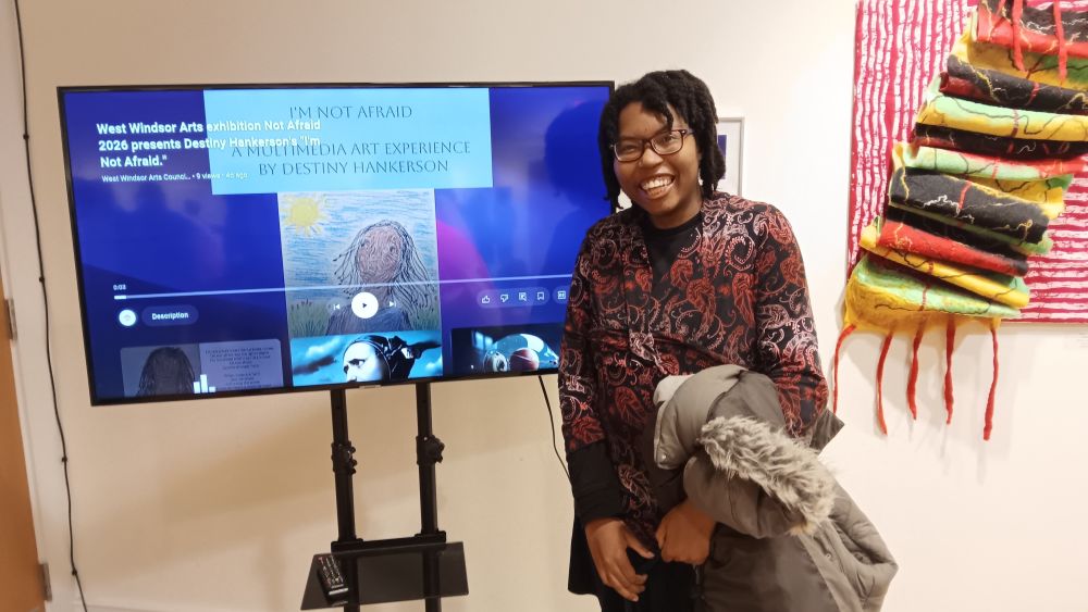 Me by the multimedia art I created for the exhibit