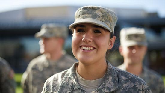 GCU Military Student Smiles in Line with Other Military Members