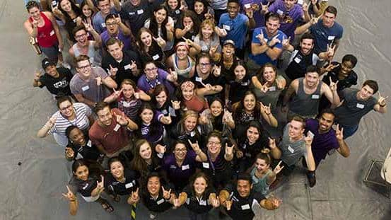 GCU students smiling in group photo on campus in spiritwear