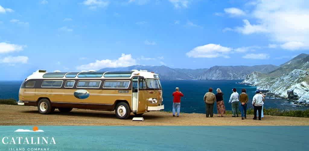 Tour bus with people enjoying scenic coastal views.