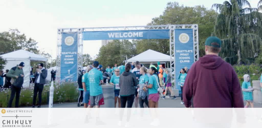 Outdoor gathering at Seattle's iconic climb event with participants under a