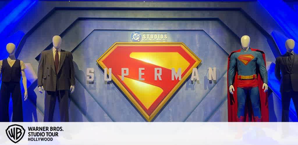 Superman display with emblem and mannequins in costumes at Warner Bros. Studio Tour.