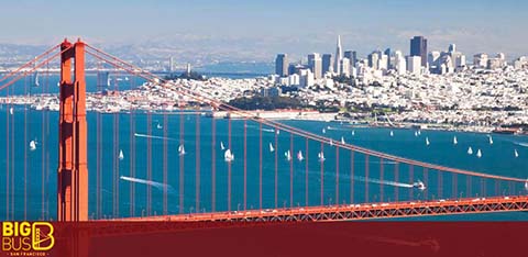 This image features a clear daytime view of the iconic Golden Gate Bridge in the foreground, with its distinctive International Orange color, and a partial view of its suspension towers. In the background, the skyline of San Francisco stretches across with various buildings, including skyscrapers under a blue sky. The calm waters below are peppered with small white sailboats. In the bottom left corner, there is a logo that reads "BIG BUS."

At FunEx.com, we're excited to offer remarkable discounts on tickets to the best tours and experiences, ensuring you enjoy the lowest prices for your next adventure.