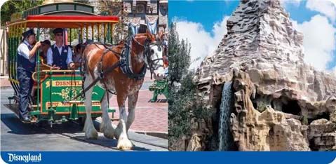 Horse-drawn tram with passengers at Disneyland; rocky mountain with cave.