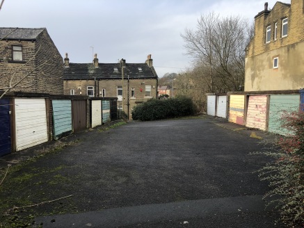 The property briefly comprises two parallel terraces of eight vacant lock-up garages separated by a strip of tarmac surfaced yard. The site is broadly rectangular in shape and of level topography throughout.