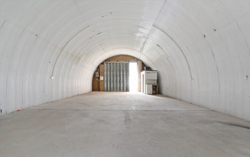 The arch is fully lined, has a roller shutter with a pedestrian door and a concrete floor. The arch benefits from electricity, water and a W/C. Access is via a service road with demised use of shared parking areas.

This arch is situated on Wickwood...