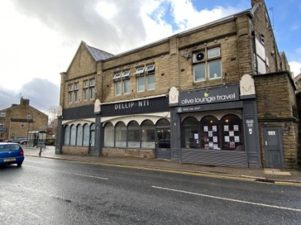 A substantial stone-built end parade retail premises in a prime main road location in the ever popular village of Barrowford.\n\nThe ground floor retail unit is located opposite The Village Pharmacy and has been occupied by an E-cigarette business bu...