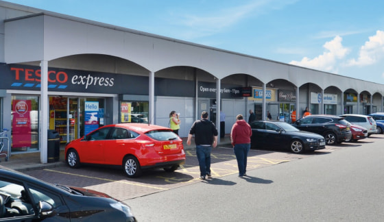 <p>The development is situated at the heart of Carfin and benefits from a prominent roadside frontage along the A723, which is the main arterial route linking Carfin with Motherwell. Existing occupiers include Tesco, Farmfoods, Greggs, Indigo Sun, Ba...