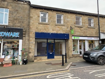 The unit comprises a small ground floor shop that forms part of a parade of stone built retail properties set under a pitched slate roof with separate office accommodation on the upper floor. Internally the unit is currently arranged to provide 3 sma...