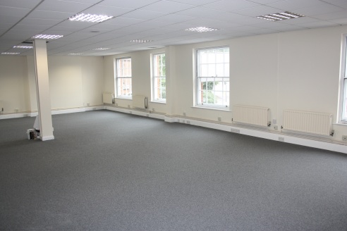 Prominent office building in central town location. N.I.A Of approx. 523.27 Sq M (5,632 Sq Ft). Open plan office accommodation with meeting rooms. Three storey premises including 11 car parking spaces. The office accommodation has been totally refurb...