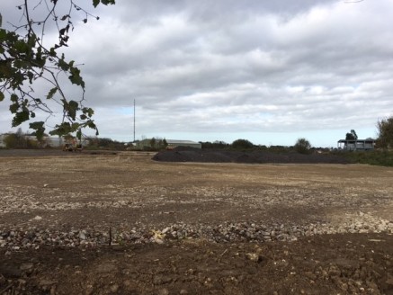 Up to 1 acre of commercial land available as a whole or in parts

The land has planning for storage (B8) and Research & Development uses.

The site is in the process of being surfaced, fenced, gated and services supplied.