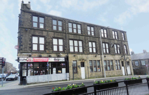 LOCATION\n\nThe property occupies a prominent main road position on the corner of Keighley Road and Newtown Street in an established retail location on the outskirts of Colne town centre. Other occupants in the immediate vicinity include Job Centre P...