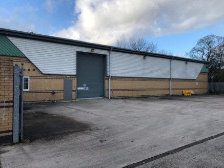 The property is a modern detached warehouse with steel portal frame and pitched roof, with part brick and part clad elevations.<br><br>Access to the unit is via an electrically operated roller shutter door from a large private yard area....