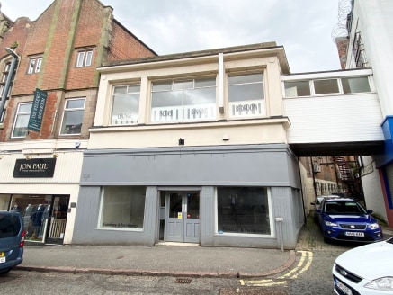 The property comprises a two storey former showroom prominently situated on Babington Lane.

The property is of traditional brick construction with window frontage on both the ground and first floor facing Babington Lane. It has a shared alleyway wit...