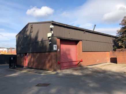 The property comprises a warehouse unit of steel portal frame construction beneath a pitched roof with part brick part blockwork, part steel clad elevations. The unit has roller shutter loading access, an eaves height of 5m. The unit has mezzanine st...