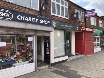 The property forms part of a parade of shops and comprises a small ground floor shop with small staff, w/c and loading area to the rear. Further accommodation is available on the first floor which benefits from separate access if required. To the rea...