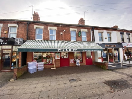 The property comprises a double fronted retail unit of traditional brick construction underneath a pitched tiled roof. The ground floor comprises of sales area/ancillary storage, there are staff facilities on the first...
