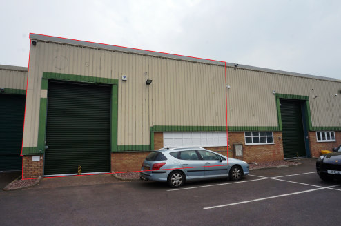 Modern Warehouse Unit\nIncludes mezzanine floor, roller shutter door, offices, staff facilities and parking\nGround Floor: 179.10 sq m (1,927 sq ft) Mezzanine: 12.97 sq m (140 sq ft)\nTotal Gross Internal Area: 192....