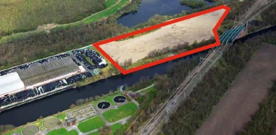 Unsurfaced site adjacent to Port Warrington. Approximately 10.15 acres. Appropriate for a development site, warehousing, processing or open storage.