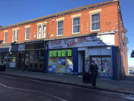 The property comprises a ground floor retail unit set within a prominent retail block fronting Front Street. Internally the accommodation is divided to form a ground floor sales area with rear storage/staff space.