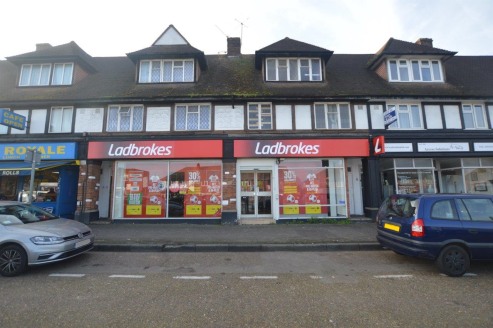 -The property comprises a double retail unit which is let to Ladbrokes Betting and Gaming Ltd on a renewed 5 year FRI lease from 31st January 2020.

- The upper parts comprise two self-contained three-bedroom maisonettes, one of which is occupied by...