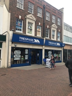 The property comprises a substantial, double fronted retail unit with rear storage and servicing via Black Horse Lane, first floor sales and second floor stock rooms and kitchen.