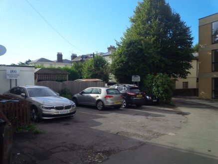 This site of some 0.028 of an acre is laid to tarmac and is capable of taking 5 cars conventionally and 6 if two cars are to be 'blocked in'. It is an established car park in this part of Ashford.