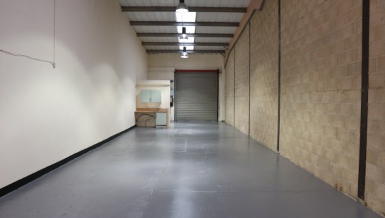 Modern end terrace industrial / warehouse within secure compound with large loading door, good natural light and good car parking.