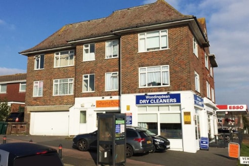 Situated in a prominent position on a busy arterial route, close to an extensive parade of local shops and a busy Tesco Esso Express service area. Frequent bus services serve this location, and Woodingdean Library, the Nuffield Hospital, Downs View ....