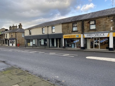 A substantial ground floor retail premises in a prominent location in the popular town of Padiham positioned between Clitheroe and Burnley.\n\nThe property is in a main road location next to Harry Garlicks and close to Padiham Paints, Tesco's Superst...