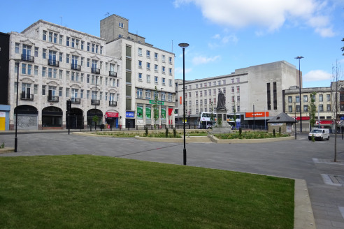 Substantial building fronting pedestrianised open square in Sheffield city centre