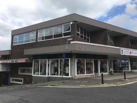 The property comprises a ground and first floor retail unit set within a two storey brick built shopping parade. Internally the accommodation is divided to form a sales area on both ground and first floors with a central staircase to access upstairs....