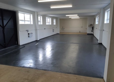 Refurbished Workshop. Single and 3 phase electricity supply, strip lighting, painted walls, extensive perimeter power points and electric heating. Four sets of doors - two double and two single. All are high security metal doors and provide secure ac...